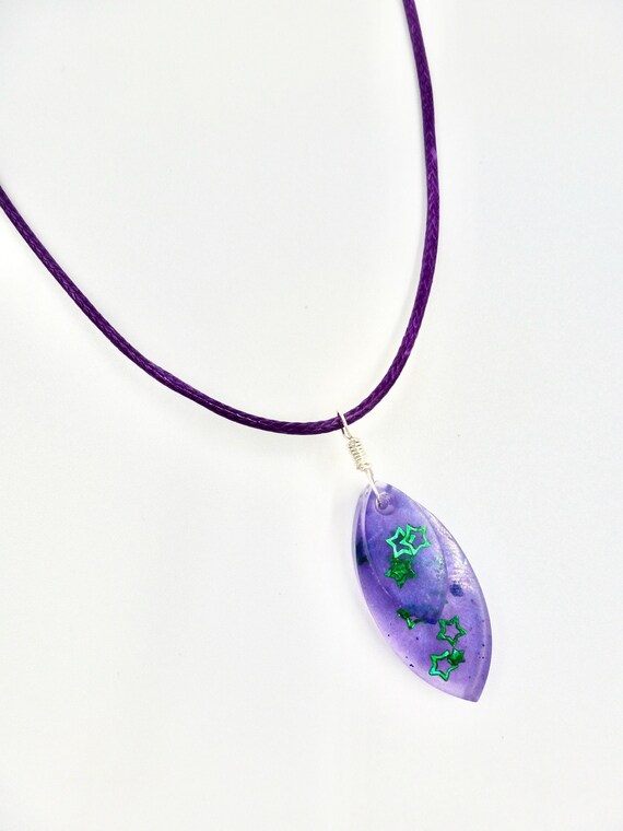 Purple Resin Green Star Sparkle Cat Eye Shaped Pendant Purple Cord Necklace by Lauren Jay Designs