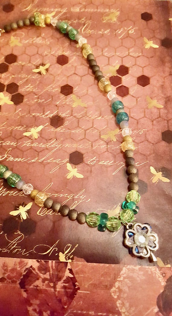 Four Leaf Clover Pendant St Patrick's Day Green, Gold and Black Beaded Necklace by Lauren Jay Designs