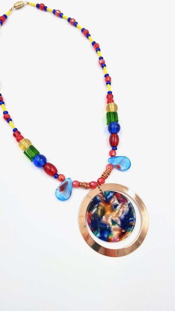 Rainbow Marbled Gold Ring Pendant Red, Yellow and Blue Beaded Necklace by Lauren Jay Designs