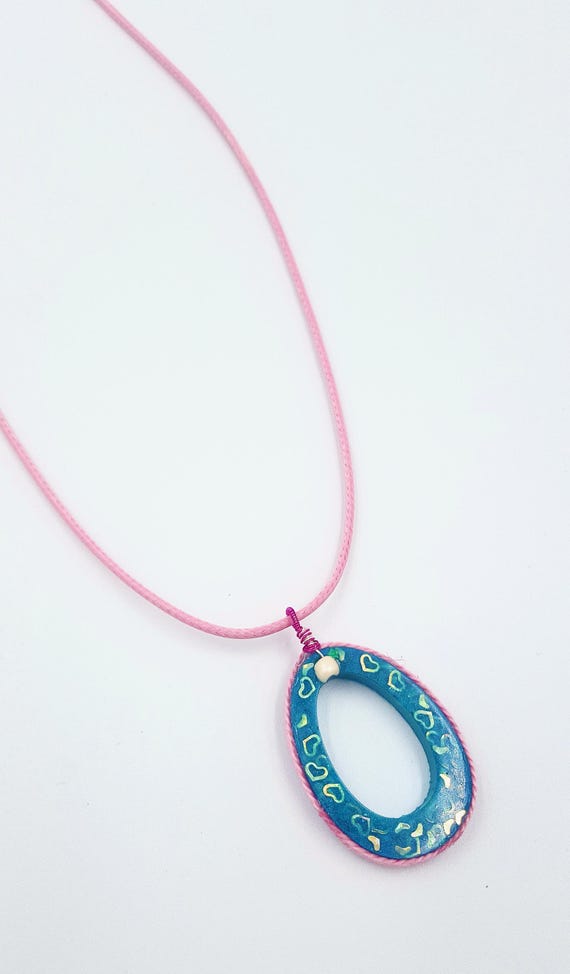 Teal Resin Gold Heart Sparkle Hoop Pendant with Pink Border on Pink Cord Necklace by Lauren Jay Designs