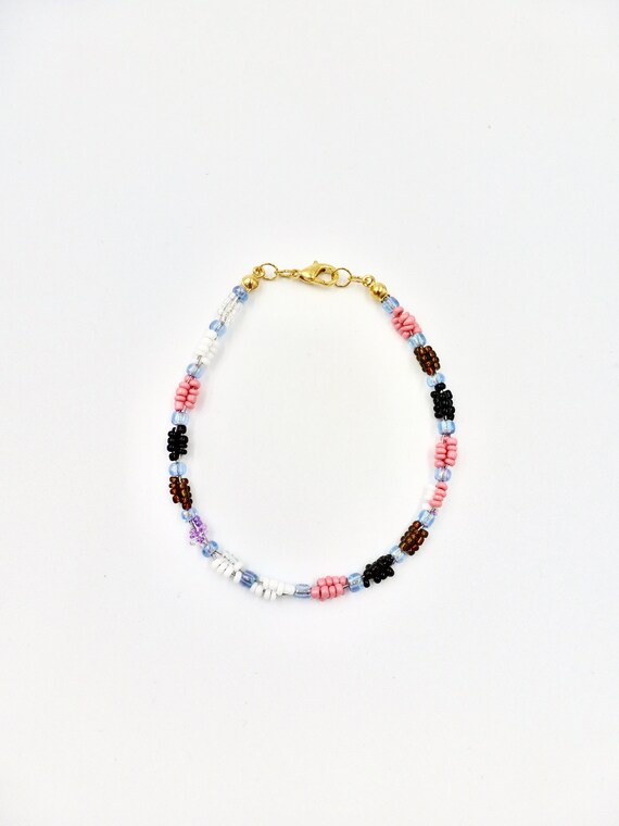 Pink, Brown, Black, White, Purple and Blue 3 Strand Beaded Bracelet by Lauren Jay Designs