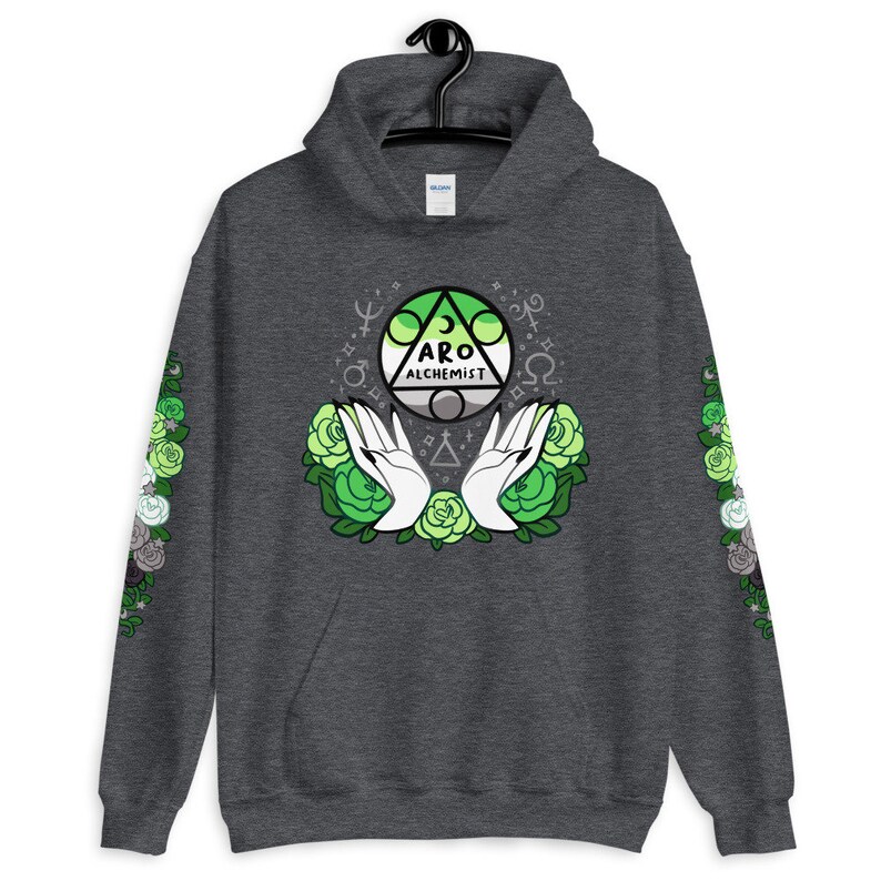 May include: A dark gray hoodie with a green, gray, and white aro alchemist symbol on the front. The symbol is surrounded by green roses and white hands. The sleeves have a pattern of green, gray, and white roses.