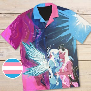 May include: Short-sleeved shirt with a striking design of two embracing figures, one with angel wings and the other with horns. The shirt's colours are pink, blue, and purple, with the text "I'd Let the World Burn for You."