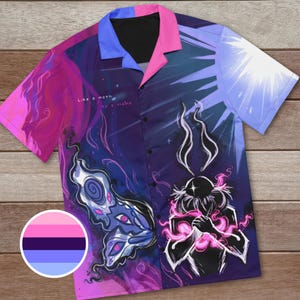 May include: A button-down shirt with a vibrant, artistic design. The shirt features a butterfly and a figure with flames, set against a purple and blue background. The collar is pink and blue, with the text "Like a moth to a flame".