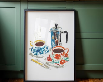 May include: A framed art print featuring a coffee-themed still life. The artwork depicts a blue and white patterned teacup, a red floral teacup, a coffee press, and a yellow knife on a white background. The frame is black, and the kitchen cabinets are green.