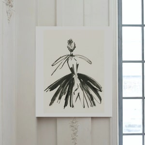 May include: Black and white line drawing of a person wearing a dress with a large skirt. The drawing is on a white background and is framed.