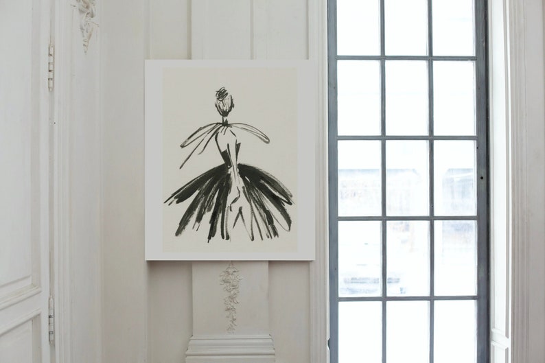 May include: Black and white line drawing of a person wearing a dress with a large skirt. The drawing is on a white background and is framed.