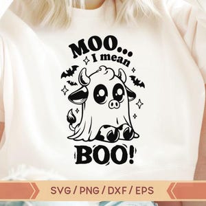 May include: A white t-shirt with a black and white graphic of a ghost cow with the text "Moo... I mean Boo!"  SVG/PNG/DXF/EPS