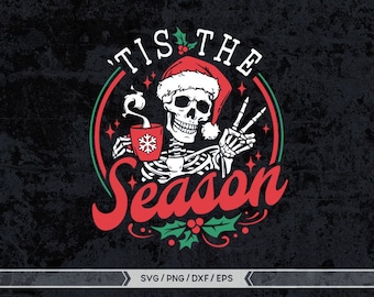 May include: A red and green Christmas-themed design featuring a skeleton wearing a Santa hat, holding a cup of coffee and giving a peace sign. The text "'Tis the Season" is written in a red, white, and green font.