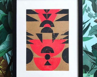 Original lino print of abstract geometric shapes in neon pink and black
