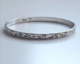 Vintage 1976 Excalibur Sterling Silver Bangle – Hand Engraved