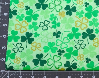 St. Patrick's Clovers on Green Fabric