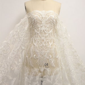 Elegant Ivory Sequins Lace Fabric: Bridal Wedding Gown Dress