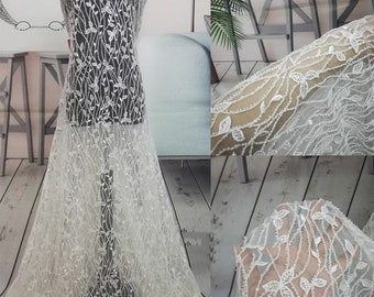 Tejido de encaje con bordado de cuentas florales: encaje para vestido de novia de alta costura en blanco roto