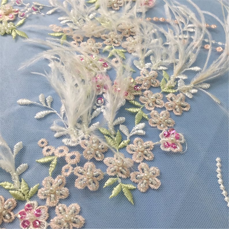 heavy hand made beaded gown dress lace fabric beading lace fabric weddingbridal dress lace fabric Beaded lace fabric with Ostrich feather