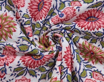 May include: White cotton fabric with a floral print in shades of pink, green, and blue. The fabric features a repeating pattern of large, stylized flowers with intricate details.