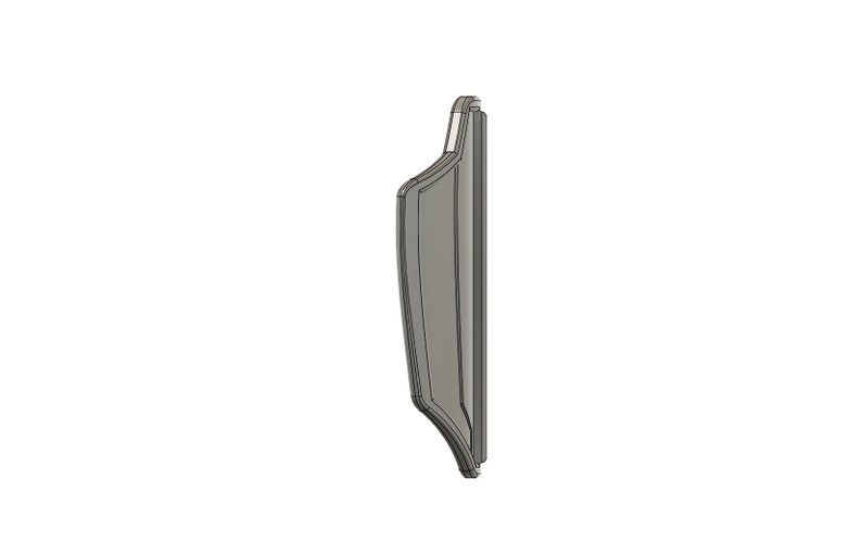 May include: A silver-colored metal shield with a slightly curved shape and a raised edge.