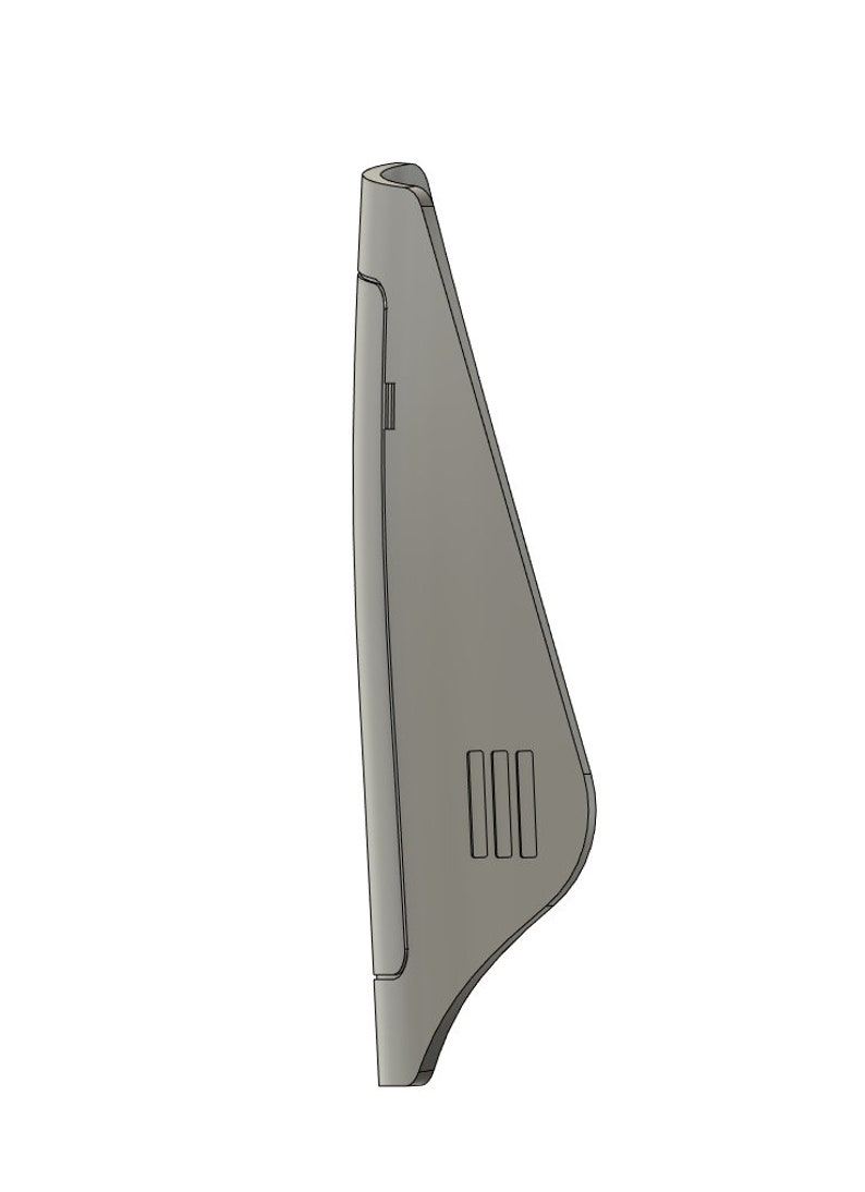 May include: A gray, triangular-shaped electronic device with a slot on the side and three small rectangular openings.