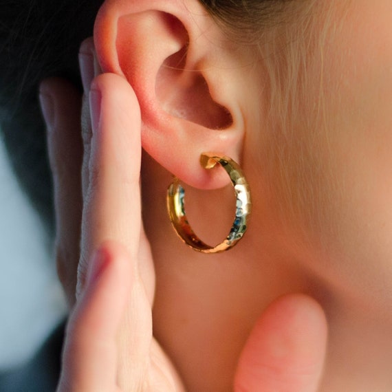 Lewis Segal huggie hoop earrings, Hammered brass … - image 1