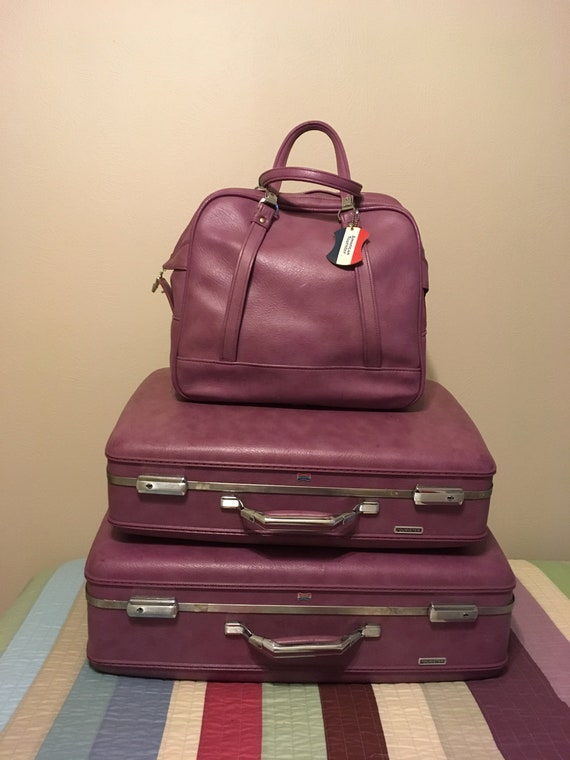 american tourister pink luggage