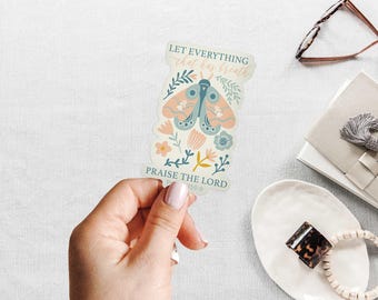 May include: A sticker with a butterfly and floral design. The text reads "Let everything that has breath praise the Lord Psalm 150:6".