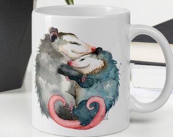 Possums étreignant une tasse de café je t'aime tellement