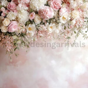 May include: A pink and white floral arrangement with a variety of flowers, including roses, peonies, and baby's breath. The flowers are arranged in a cascading style, creating a romantic and elegant look.