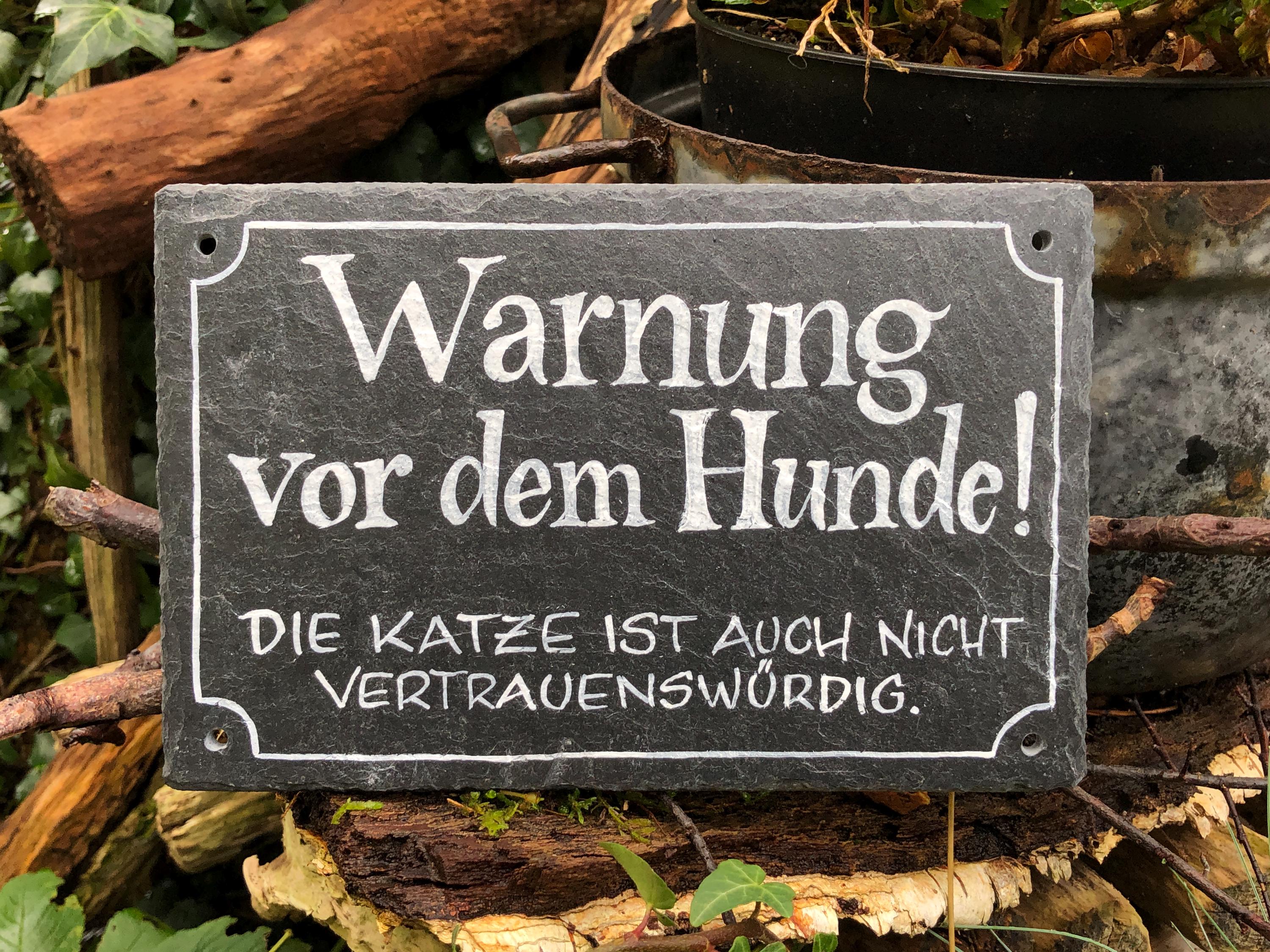 slate - handwritten, sign "dog"