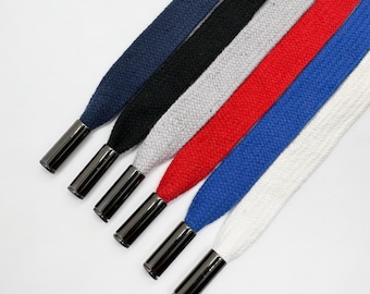 Cordón plano de 13 mm con topes metálicos