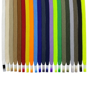 May include: A variety of colorful shoelaces in different colors, including white, beige, brown, red, yellow, orange, blue, green, purple, and black.