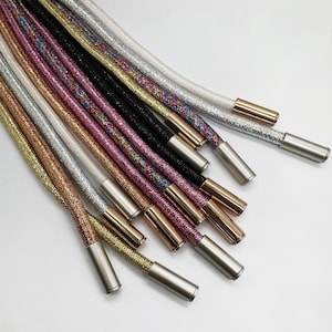 Glitterkoorden met metalen stoppers
