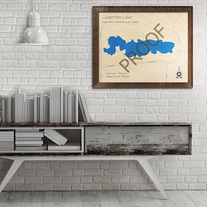 May include: A framed map of Carpenter Lake in Matanuska-Susitna Borough, Alaska. The map shows the lake's shape and depth contours in blue. The lake area is 176 acres and the deepest point is 30 feet.