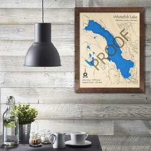May include: A framed map of Whitefish Lake in Flathead County, Montana. The map shows the lake's depth contours in blue, with the deepest point being 232 feet. The lake area is 5,315 acres.