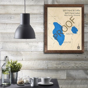 May include: A wooden map of Split Hand & Little Split Hand Lakes in Itasca County, Minnesota. The map shows the lake's depth contours in blue.
