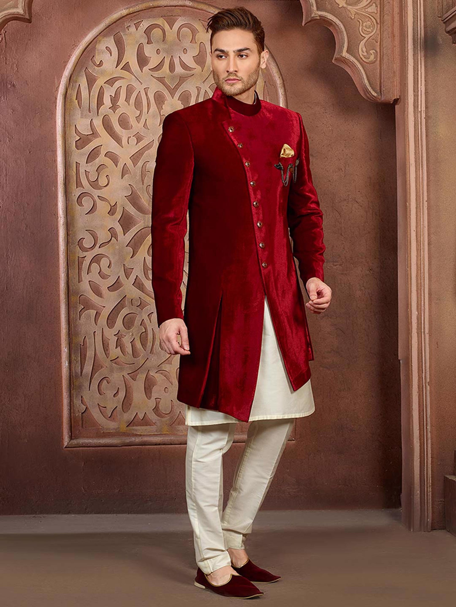 sherwani with red lehenga