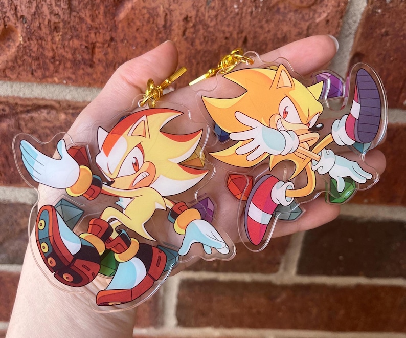 Super Sonic & Shadow Spinning Acrylic Keychains image 1