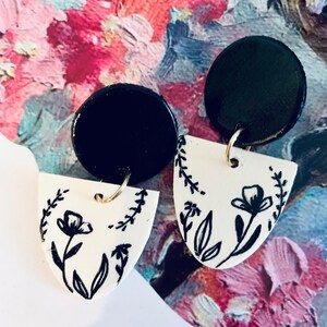 Black and white floral earrings