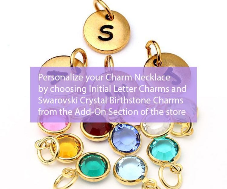 May include: Gold charm necklace with initial letter and crystal birthstone charms. Personalize your charm necklace by choosing initial letter charms and Swarovski crystal birthstone charms from the Add-On Section of the store.