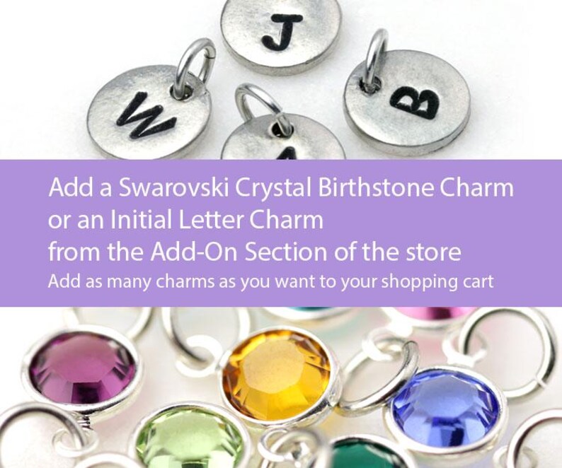 May include: A close-up of silver charms with the letters W, J, and B. The charms are for adding to jewelry. The text below the charms reads "Add a Swarovski Crystal Birthstone Charm or an Initial Letter Charm from the Add-On Section of the store. Add as many charms as you want to your shopping cart."