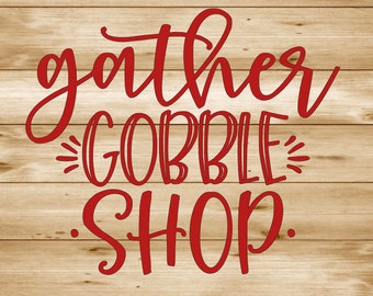 May include: Red text on a wood background reads "gather gobble shop".