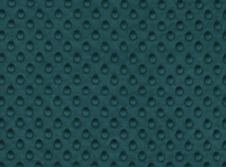 May include: Teal-colored fabric with a repeating pattern of raised, rounded dots. The dots are evenly spaced across the surface, creating a textured appearance. The fabric has a soft, velvety look.