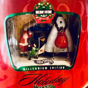 Vintage 1990s Hot Wheels Holiday Millennium Edition Holiday Future Set 3 of 3 Santa Spaceship. Package unopened.