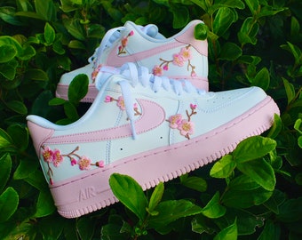 light pink nike air force ones