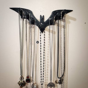Bat necklace holder deals