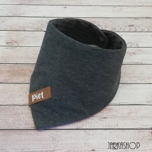 May include: Gray cotton bandana with a brown leather label that says "piet".