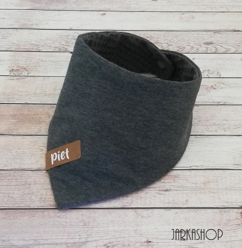 May include: Gray cotton bandana with a brown leather label that says "piet".