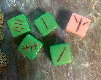 Bawwwk's Knucklebones Set of 4d6 (Dark Green)  and 1d3 (White) with sealed bag. Far realm magic may or may not be included.