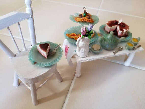Table Top And Chair With Cake And Tea Setting
