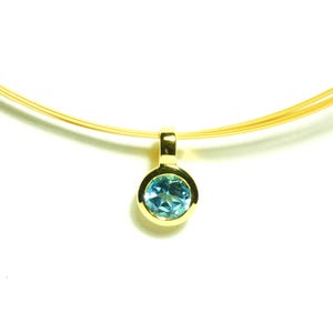 Pingente de topázio dourado redondo