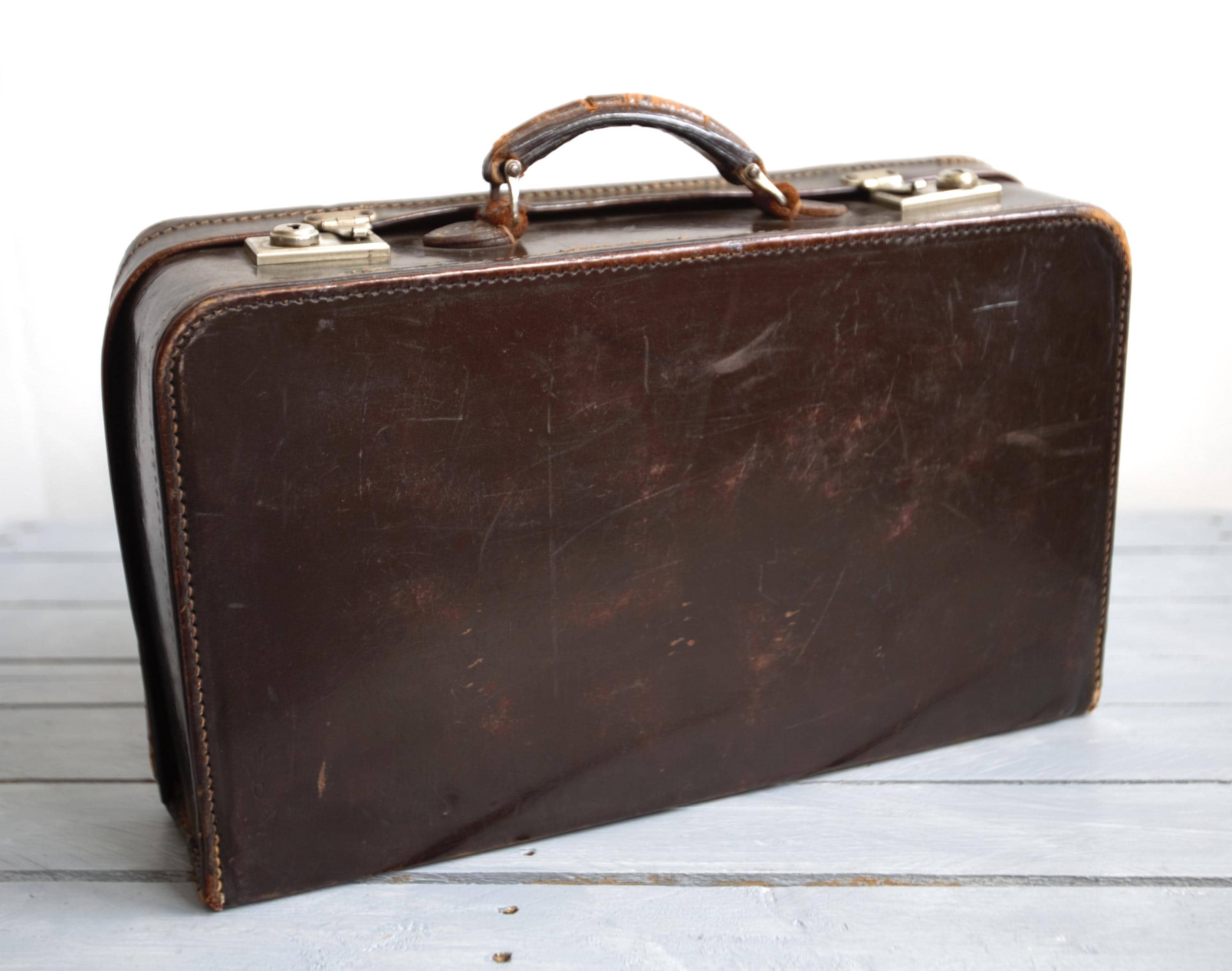 Koffer leder alt